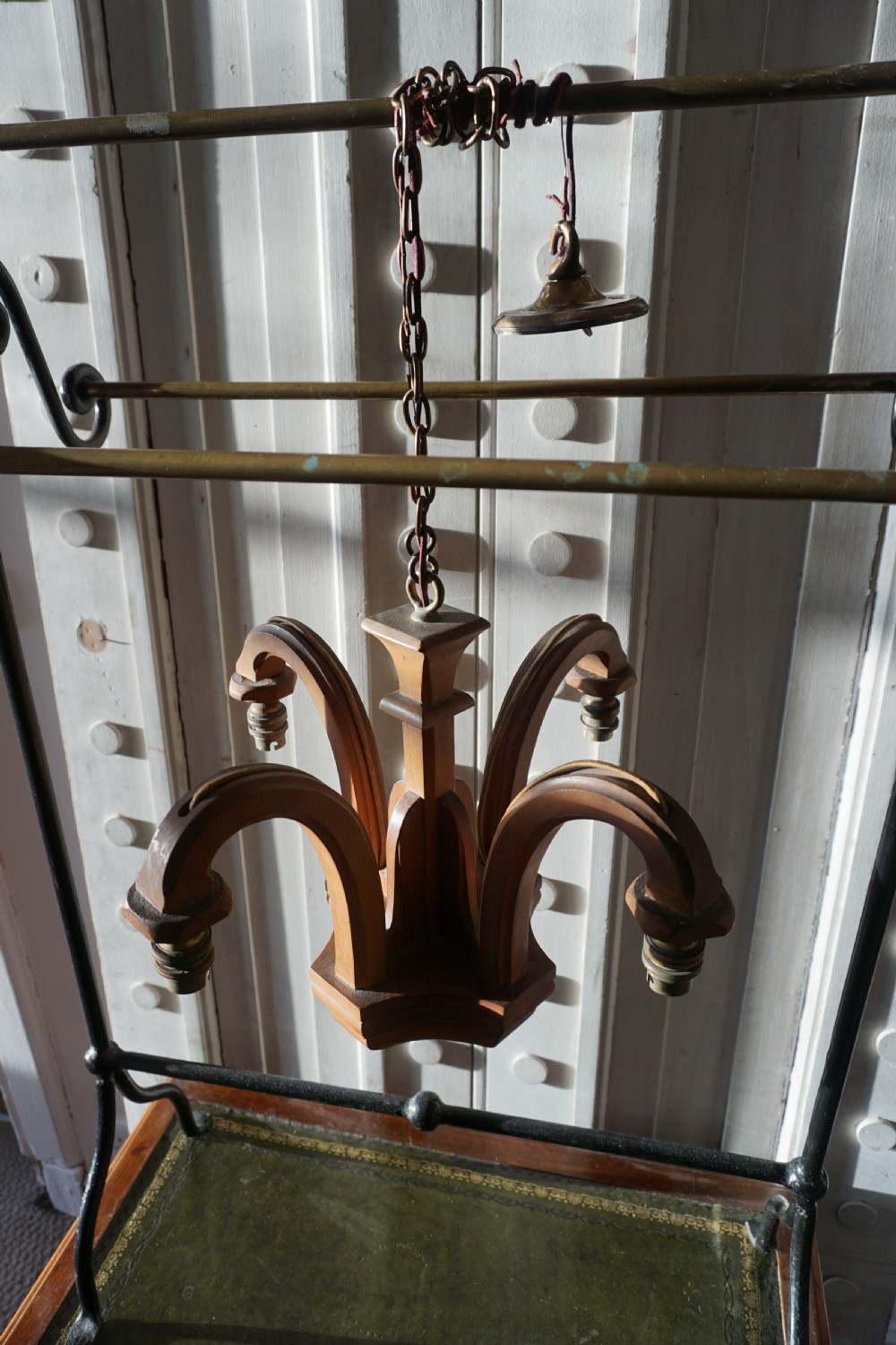 Attributed to Sir Robert Lorimer (1864-1929) An Arts and Crafts carved walnut ceiling pendant View III