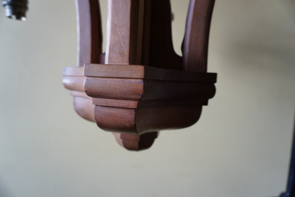 Attributed to Sir Robert Lorimer (1864-1929) An Arts and Crafts carved walnut ceiling pendant View V