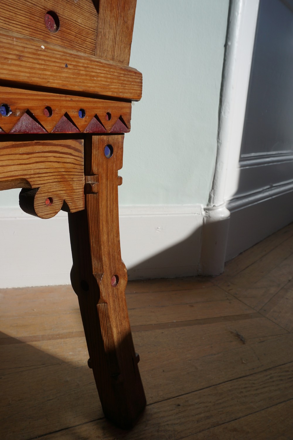 A pitch pine and coloured enamel Gothic Revival hall chair in the manner of Bruce Talbert, 1860s View VI