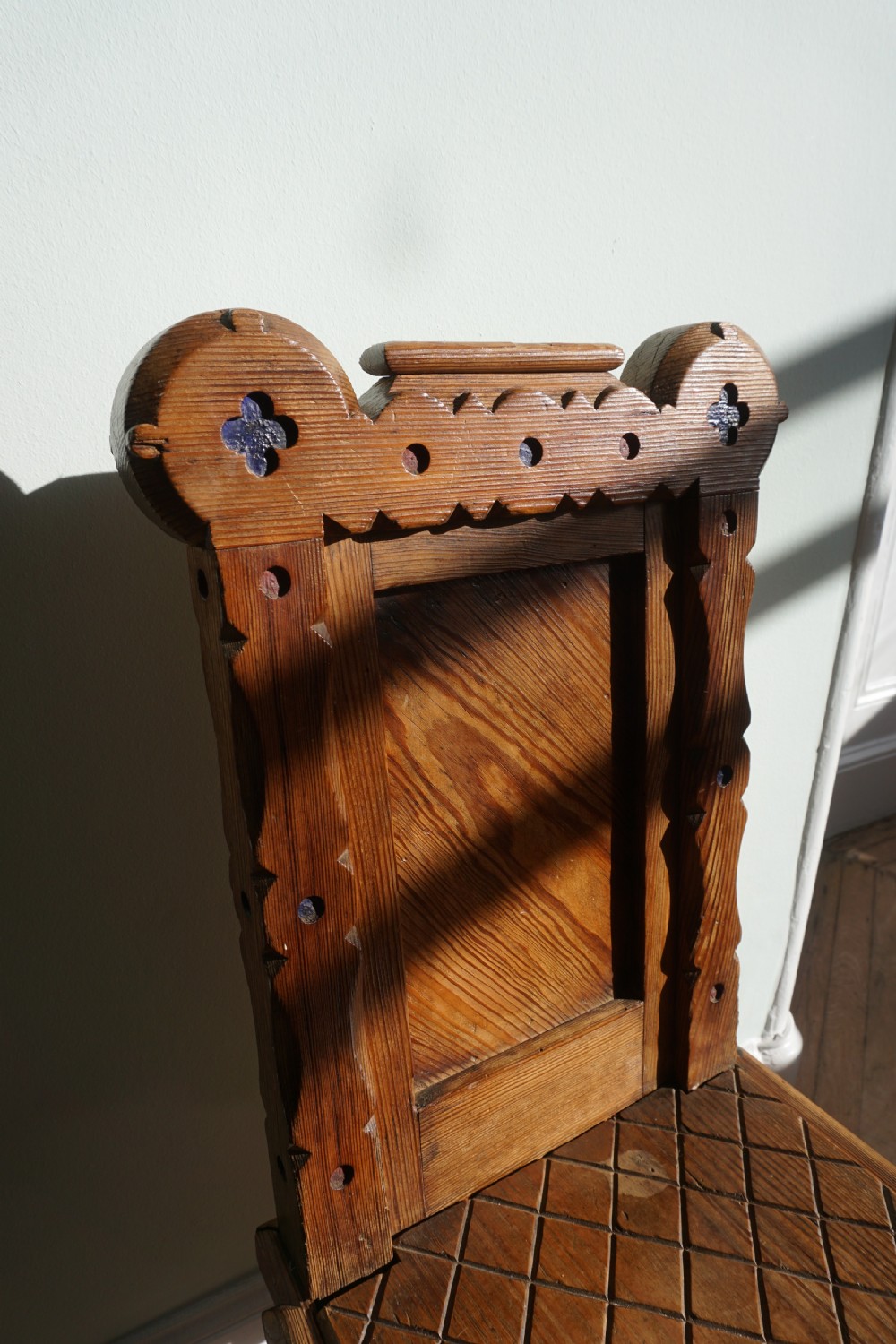 A pitch pine and coloured enamel Gothic Revival hall chair in the manner of Bruce Talbert, 1860s View IX