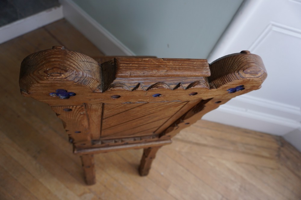 A pitch pine and coloured enamel Gothic Revival hall chair in the manner of Bruce Talbert, 1860s View II