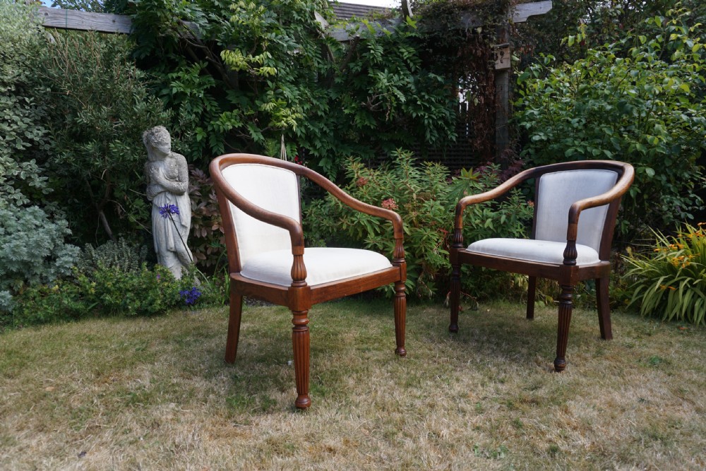 A pair of 19th century Anglo-Indian bergere armchairs