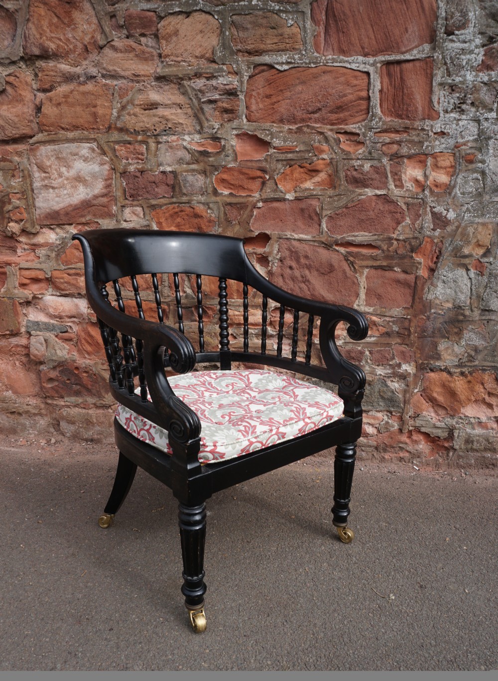 A Scottish George IV ebonised library bergere armchair View IV