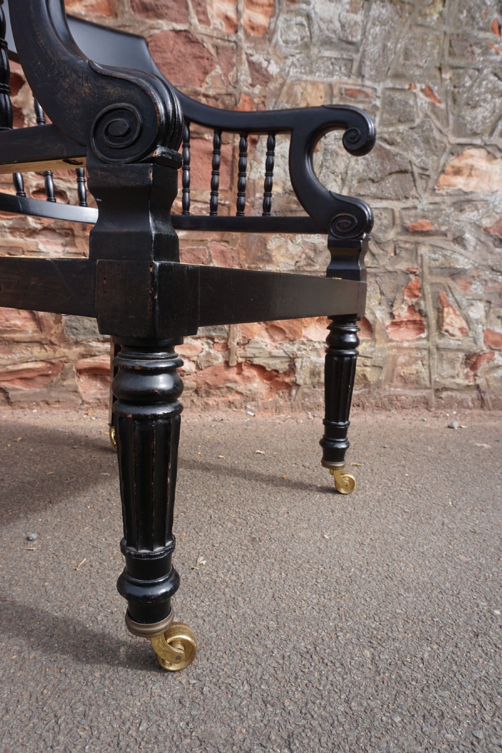 A Scottish George IV ebonised library bergere armchair View VI