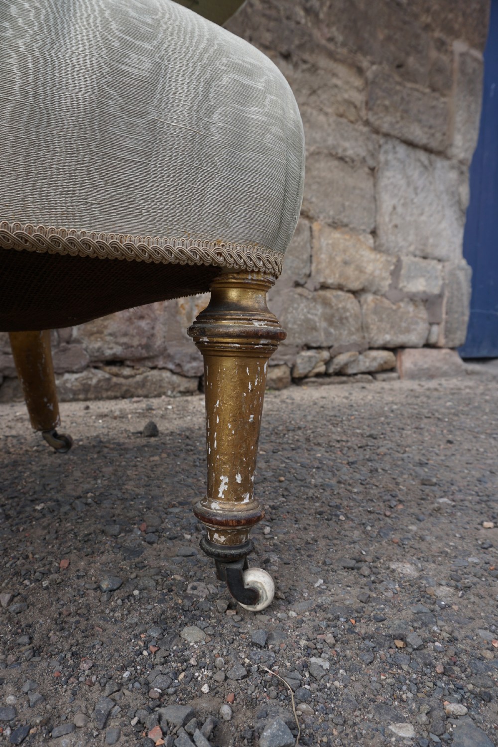 A Victorian giltwood tub chair by Holland & Sons of London View V