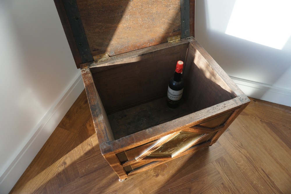 An Aesthetic Movement walnut sarcopagus-shaped coal box or cellaret by Holland & Sons or similar, 1880s. View VIII