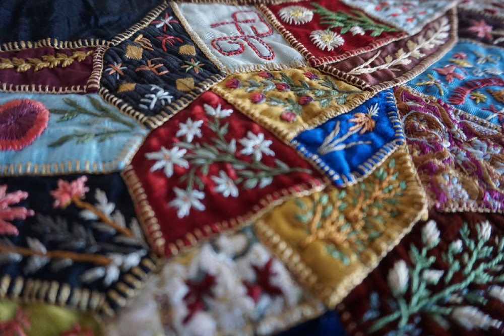 A fine Victorian Aesthetic 'crazy' patchwork parlour panel, comprising intricately hand-worked silk and velvet sections. View IV