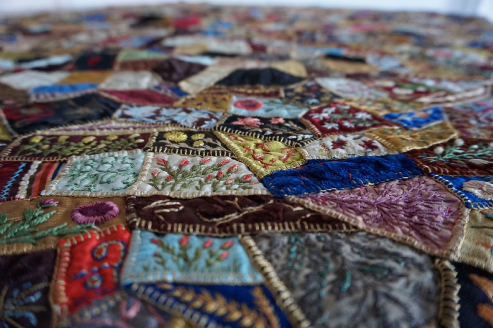 A fine Victorian Aesthetic 'crazy' patchwork parlour panel, comprising intricately hand-worked silk and velvet sections. View V