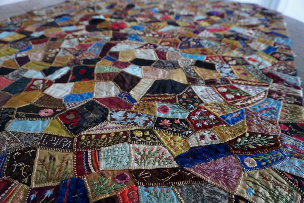 A fine Victorian Aesthetic 'crazy' patchwork parlour panel, comprising intricately hand-worked silk and velvet sections. View VI