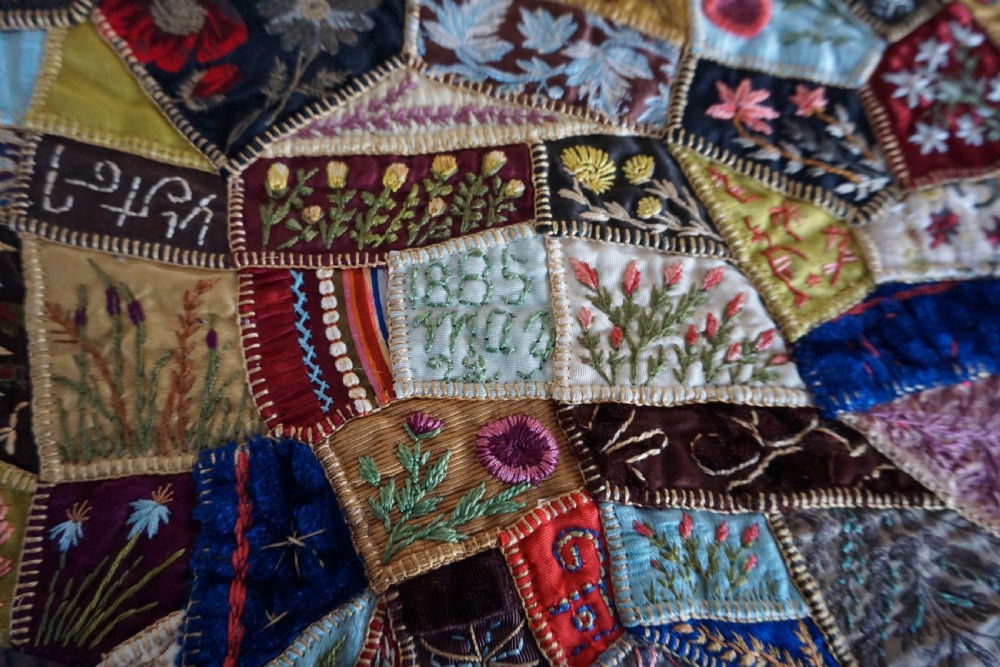 A fine Victorian Aesthetic 'crazy' patchwork parlour panel, comprising intricately hand-worked silk and velvet sections. View IX