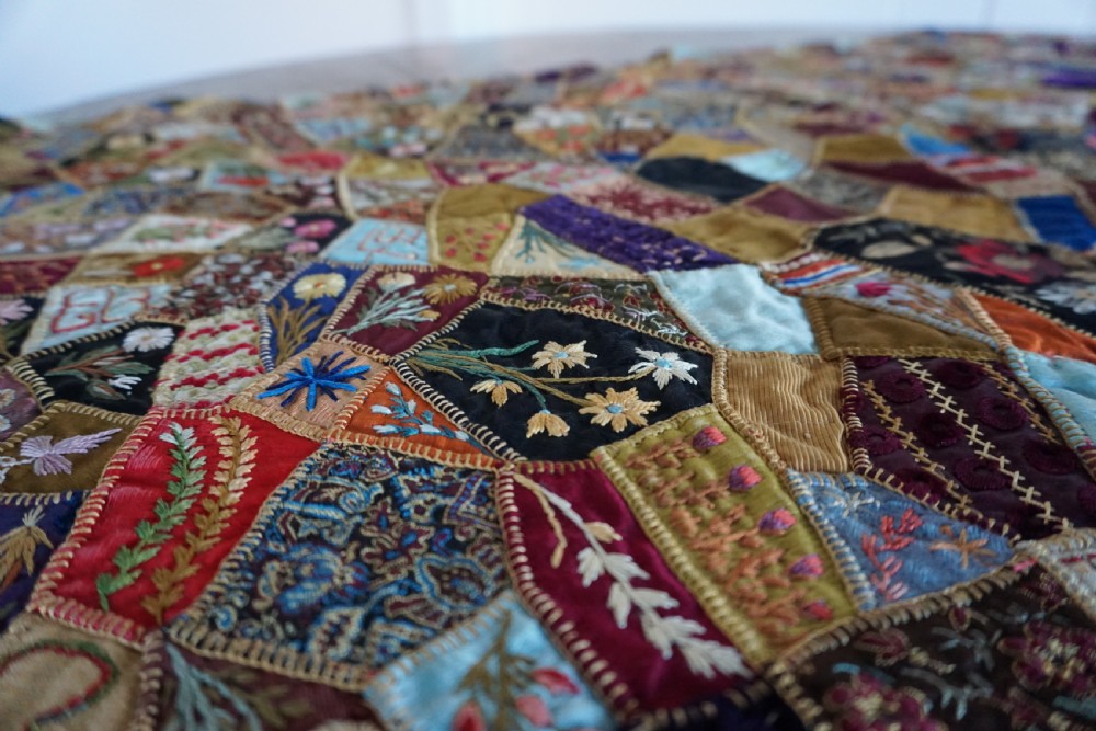 A fine Victorian Aesthetic 'crazy' patchwork parlour panel, comprising intricately hand-worked silk and velvet sections. View X