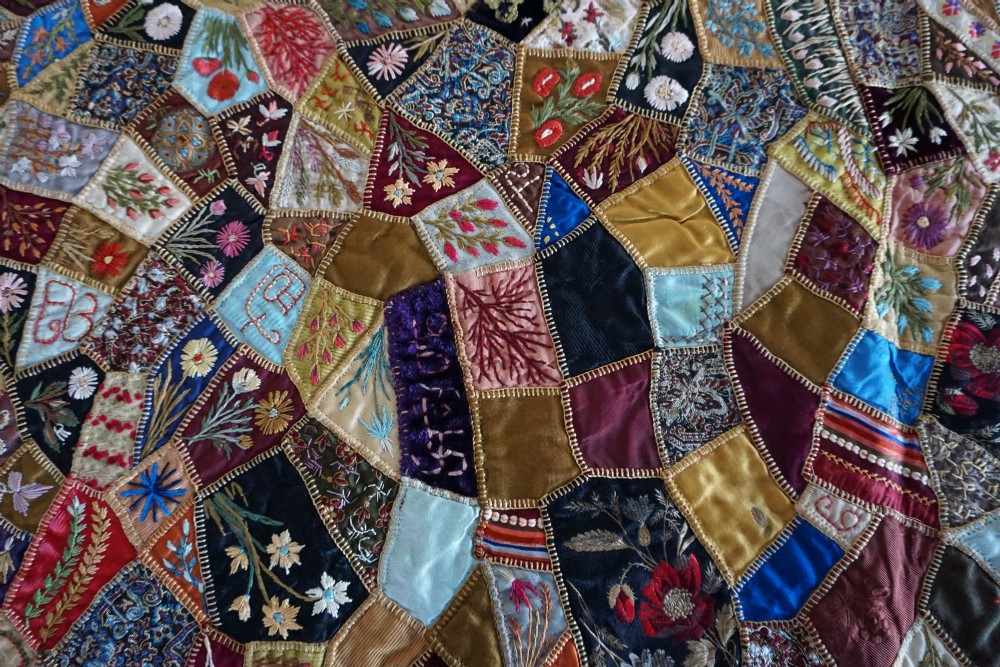 A fine Victorian Aesthetic 'crazy' patchwork parlour panel, comprising intricately hand-worked silk and velvet sections. View XI