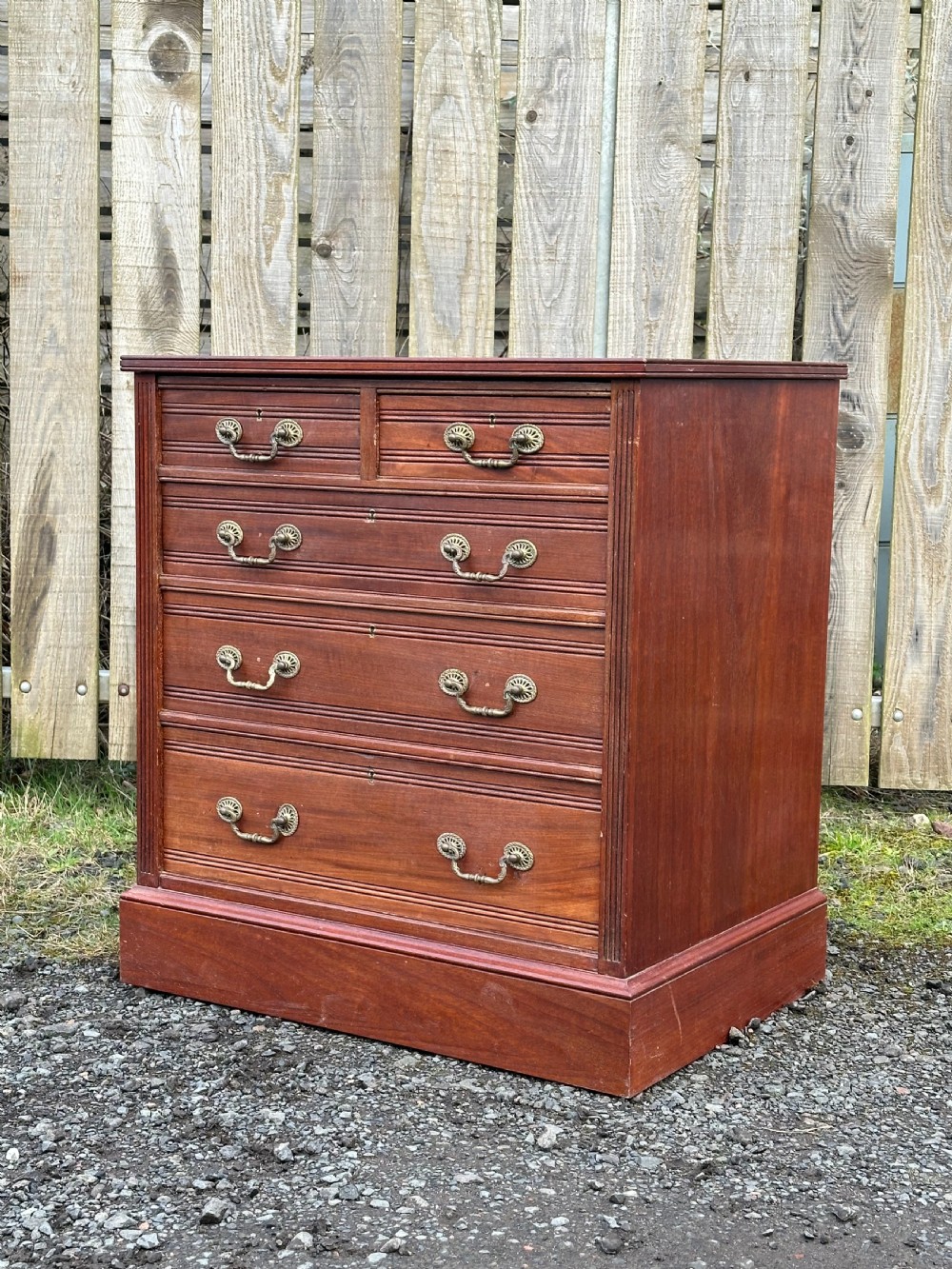 A small 19th century walnut chest of drawers, probably London made, c.1870 View IV