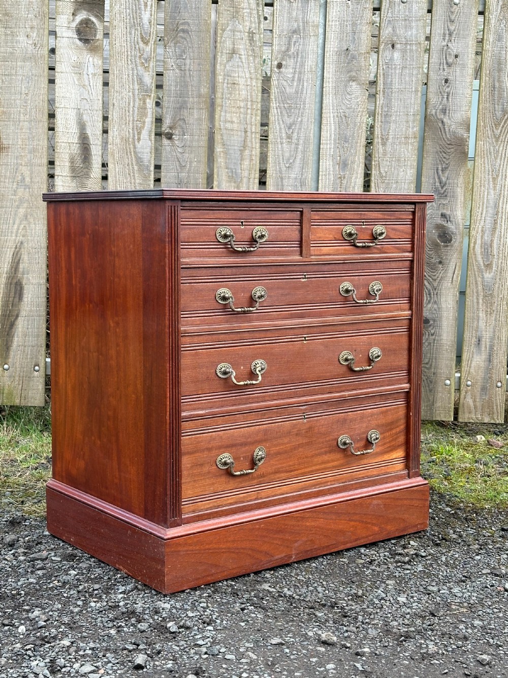 A small 19th century walnut chest of drawers, probably London made, c.1870