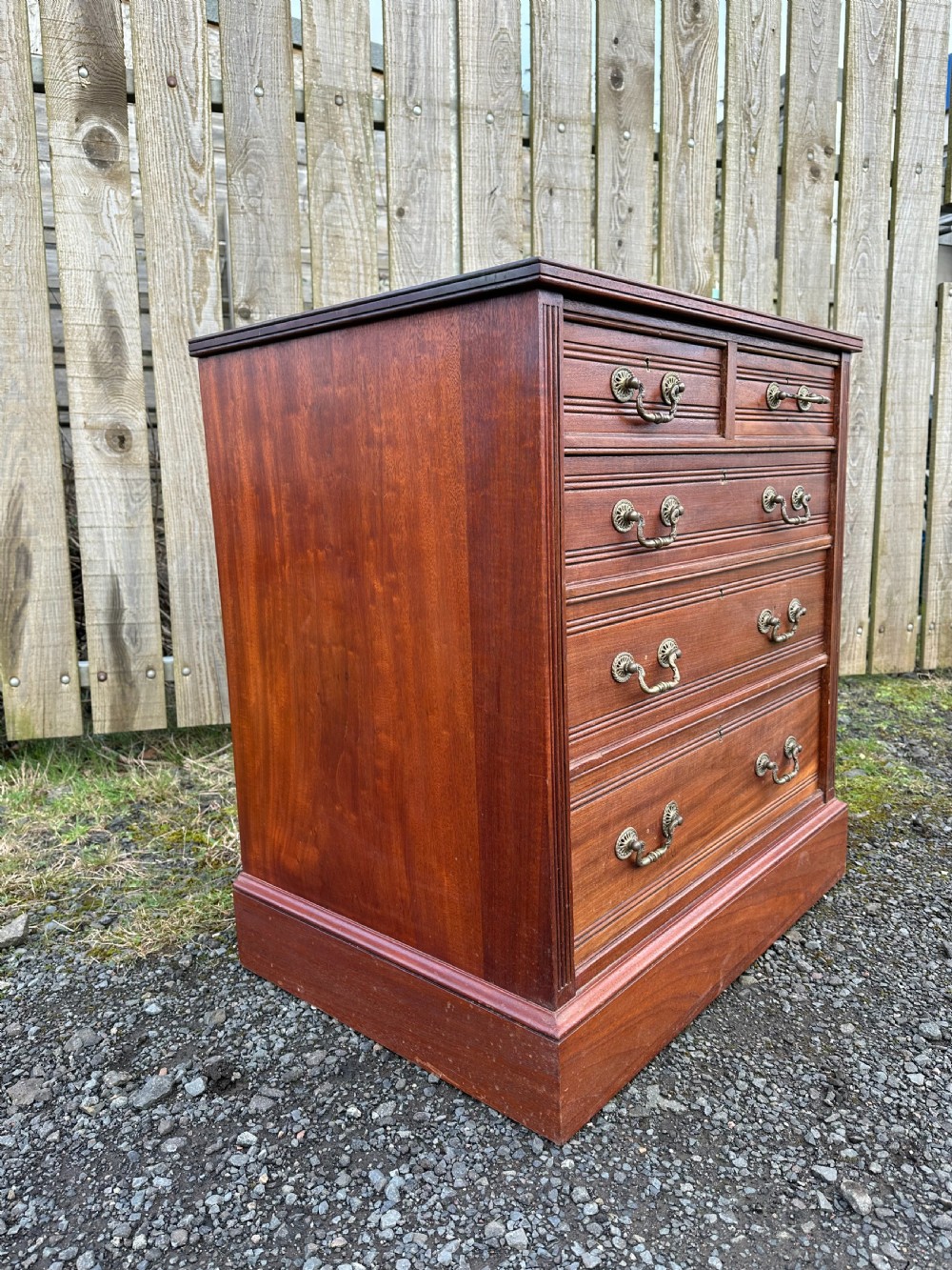A small 19th century walnut chest of drawers, probably London made, c.1870 View VIII