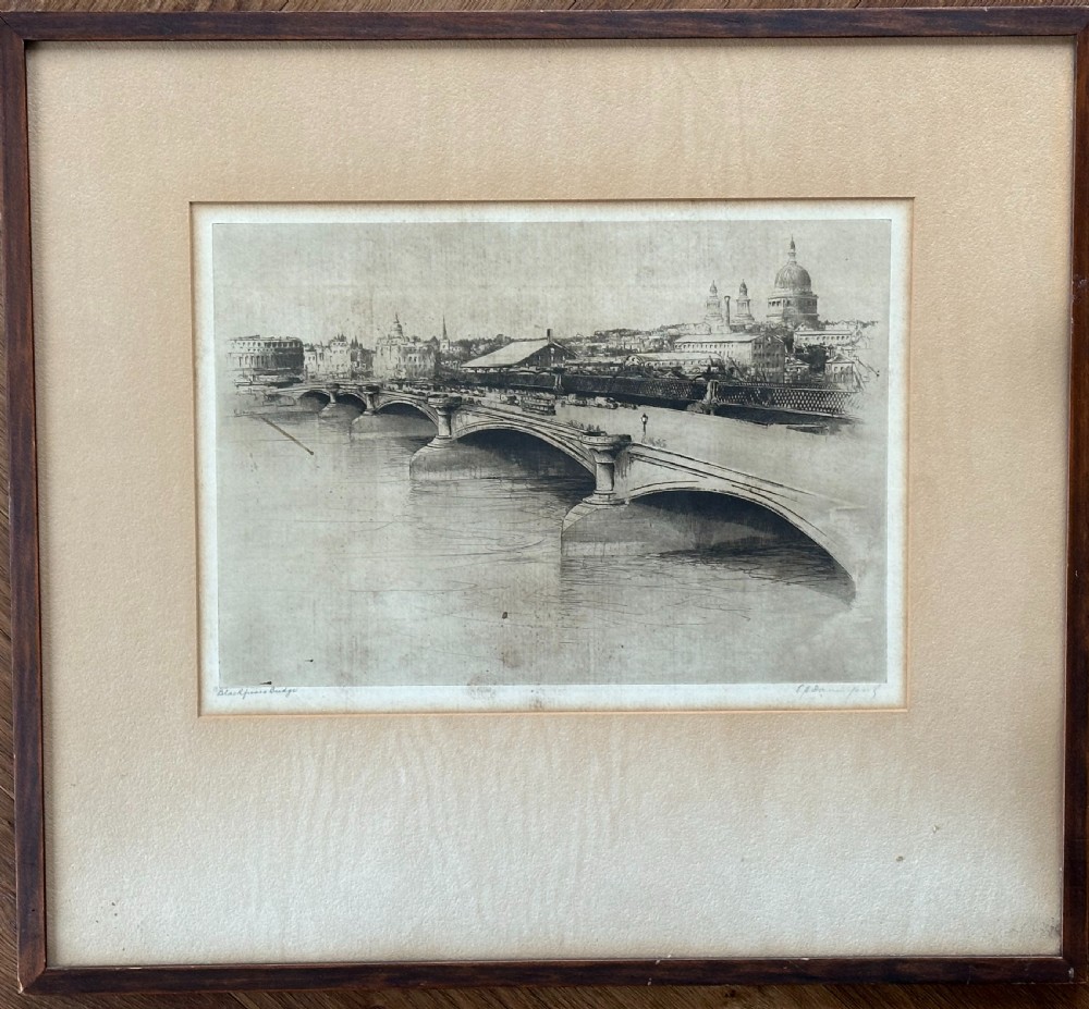 A monochrome drypoint etching depicting Blackfriars Bridge over the River Thames with St Pauls Cathedral visible in the London skyline. View IV