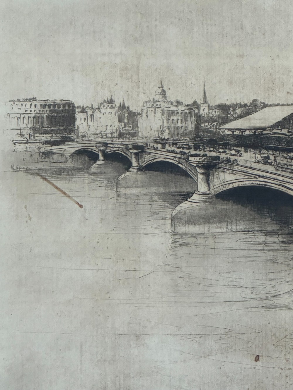A monochrome drypoint etching depicting Blackfriars Bridge over the River Thames with St Pauls Cathedral visible in the London skyline. View V