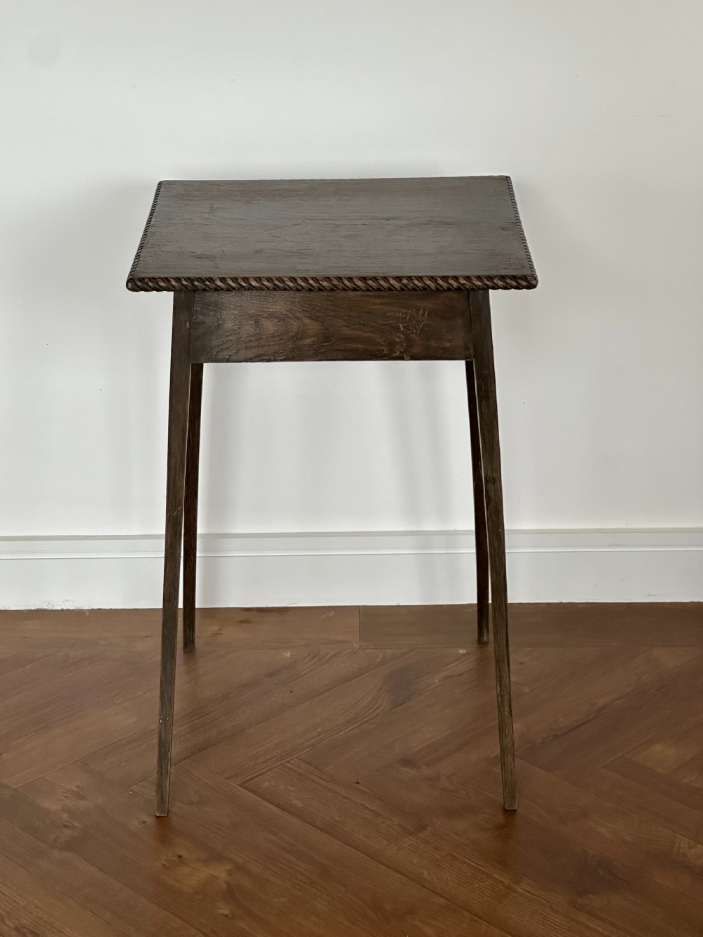 An Arts and Crafts green ash 'spider leg' table in the manner of Liberty of London, c.1900 View II