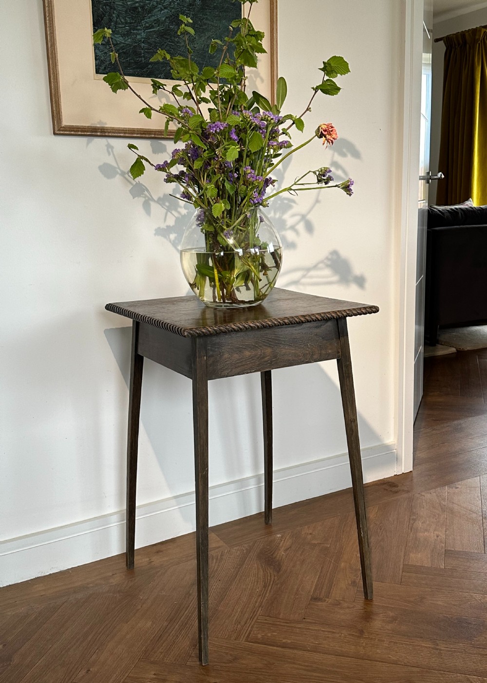 An Arts and Crafts green ash 'spider leg' table in the manner of Liberty of London, c.1900