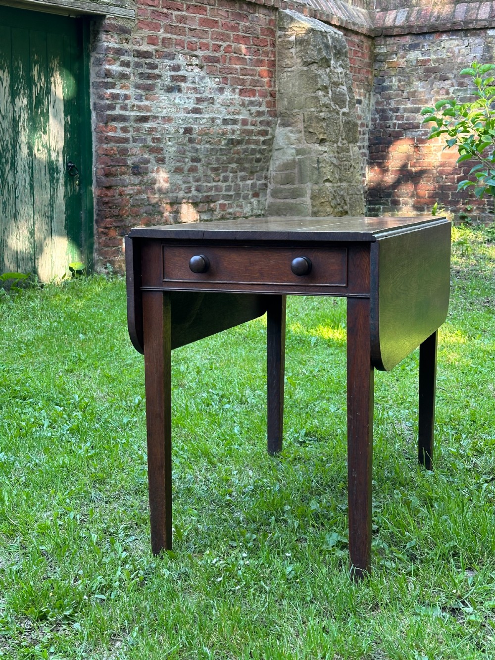 A George III oak kitchen table c.1800