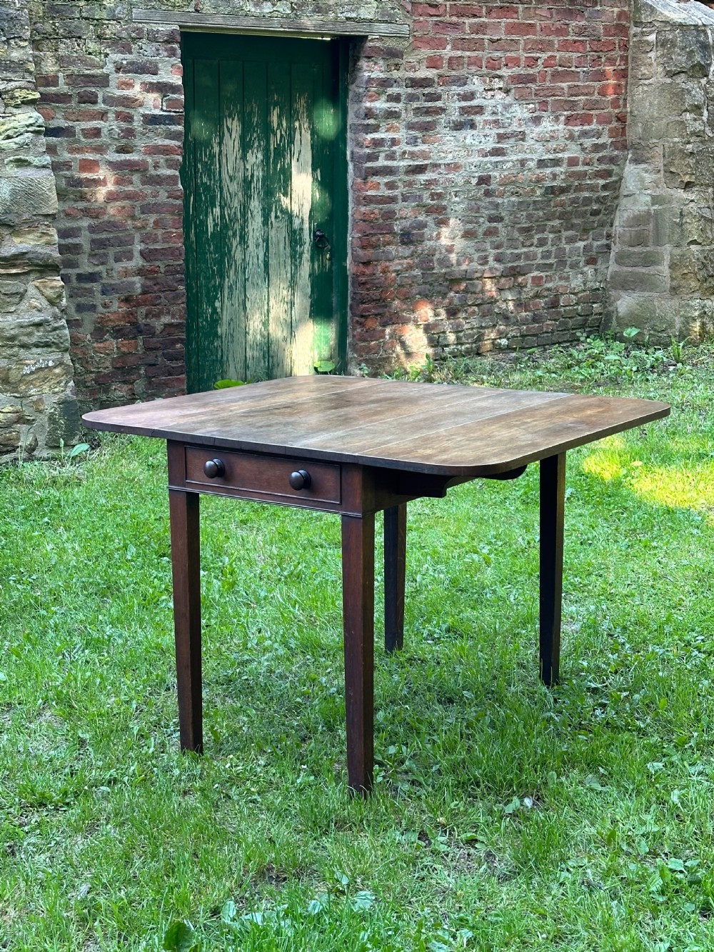 A George III oak kitchen table c.1800 View III