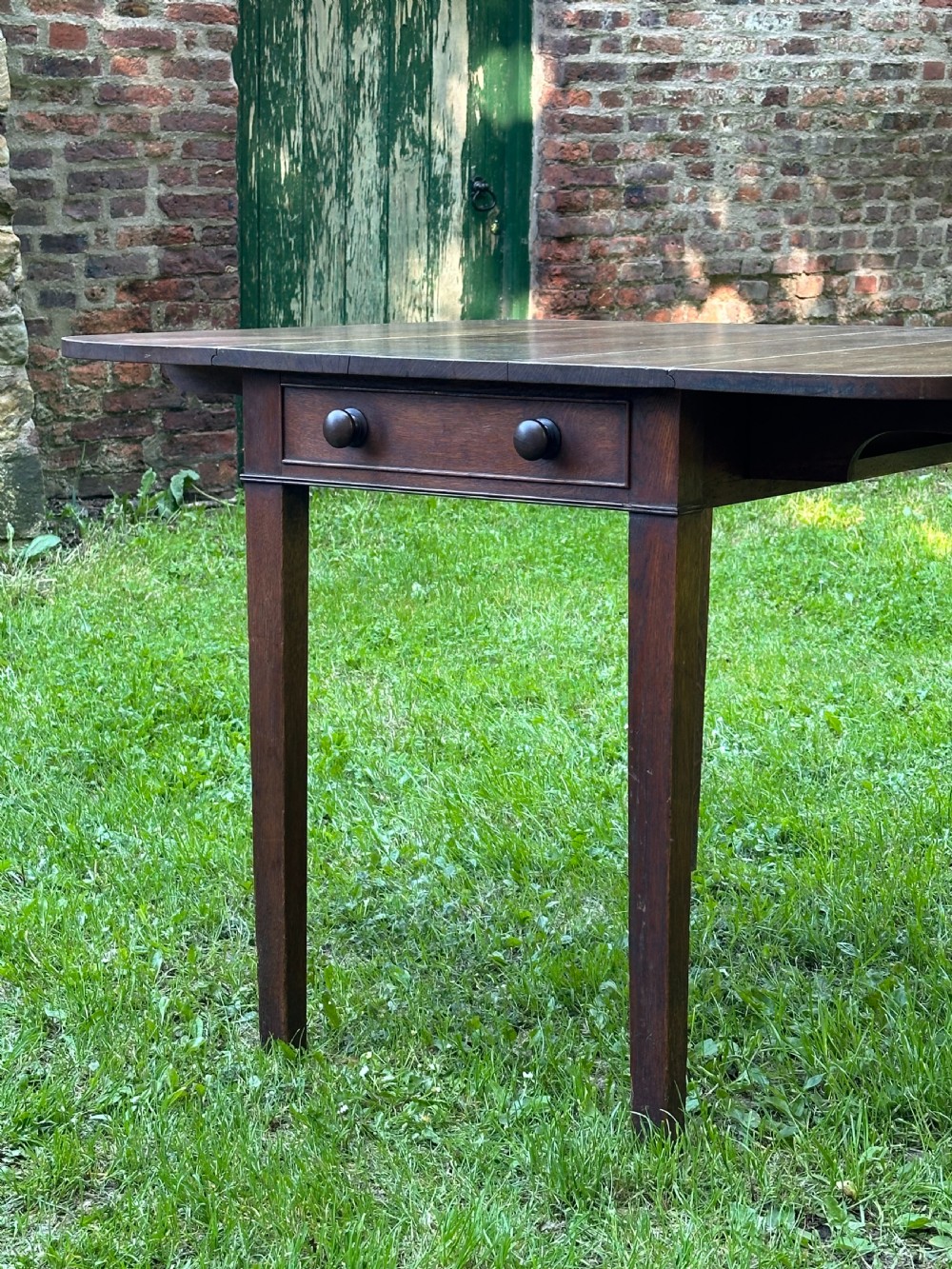 A George III oak kitchen table c.1800 View IV