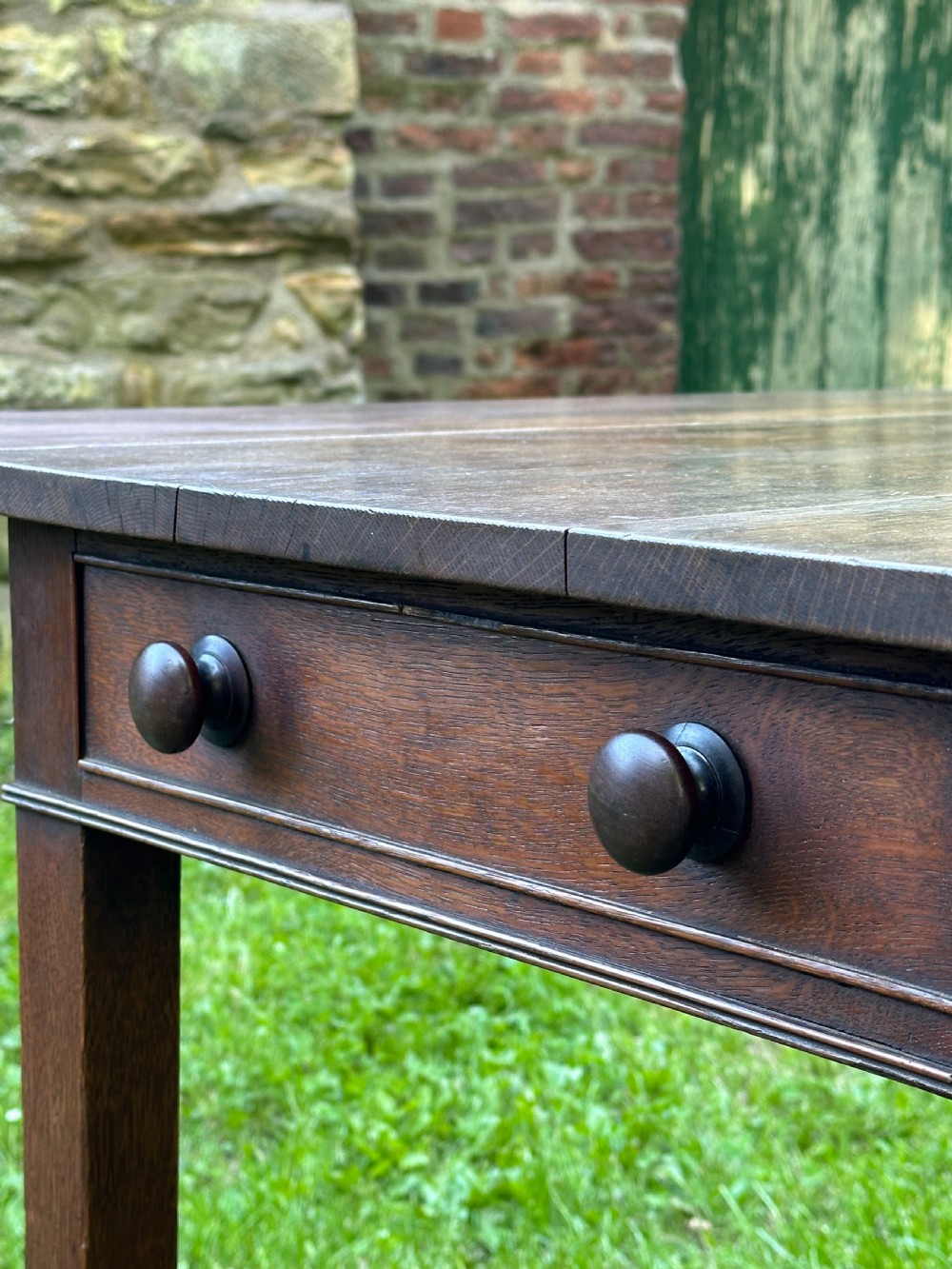 A George III oak kitchen table c.1800 View X