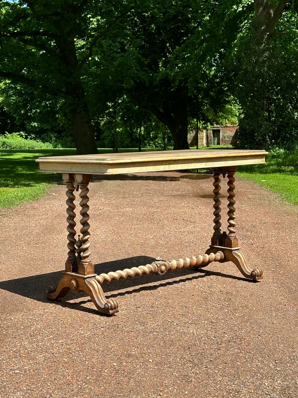 A rare walnut Antiquarian centre table by Johnstone & Jeanes, 67 New Bond Street, London, c.1840