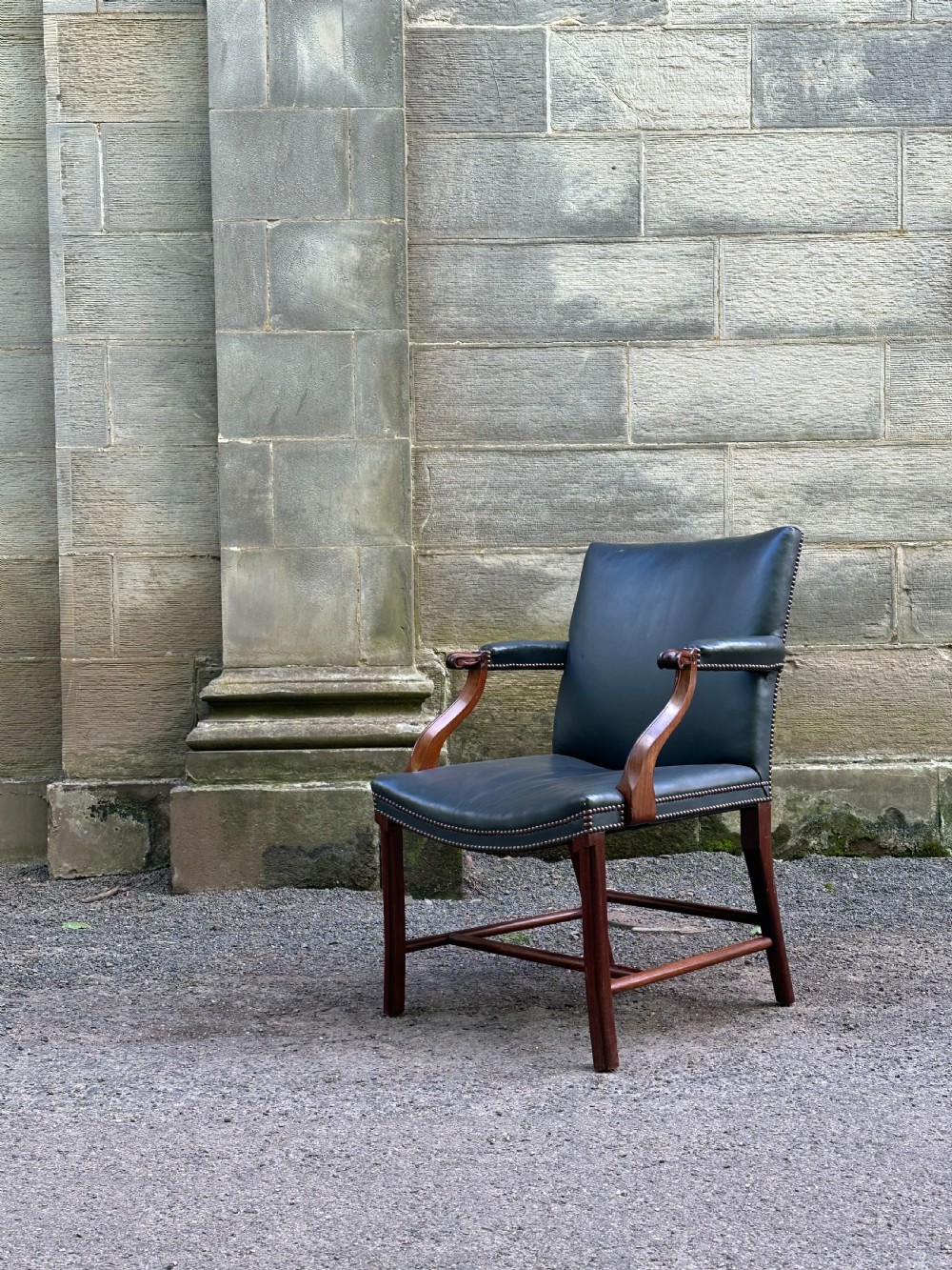 A Scottish mahogany Cockpen library chair by Whytock & Reid of Edinburgh View VI