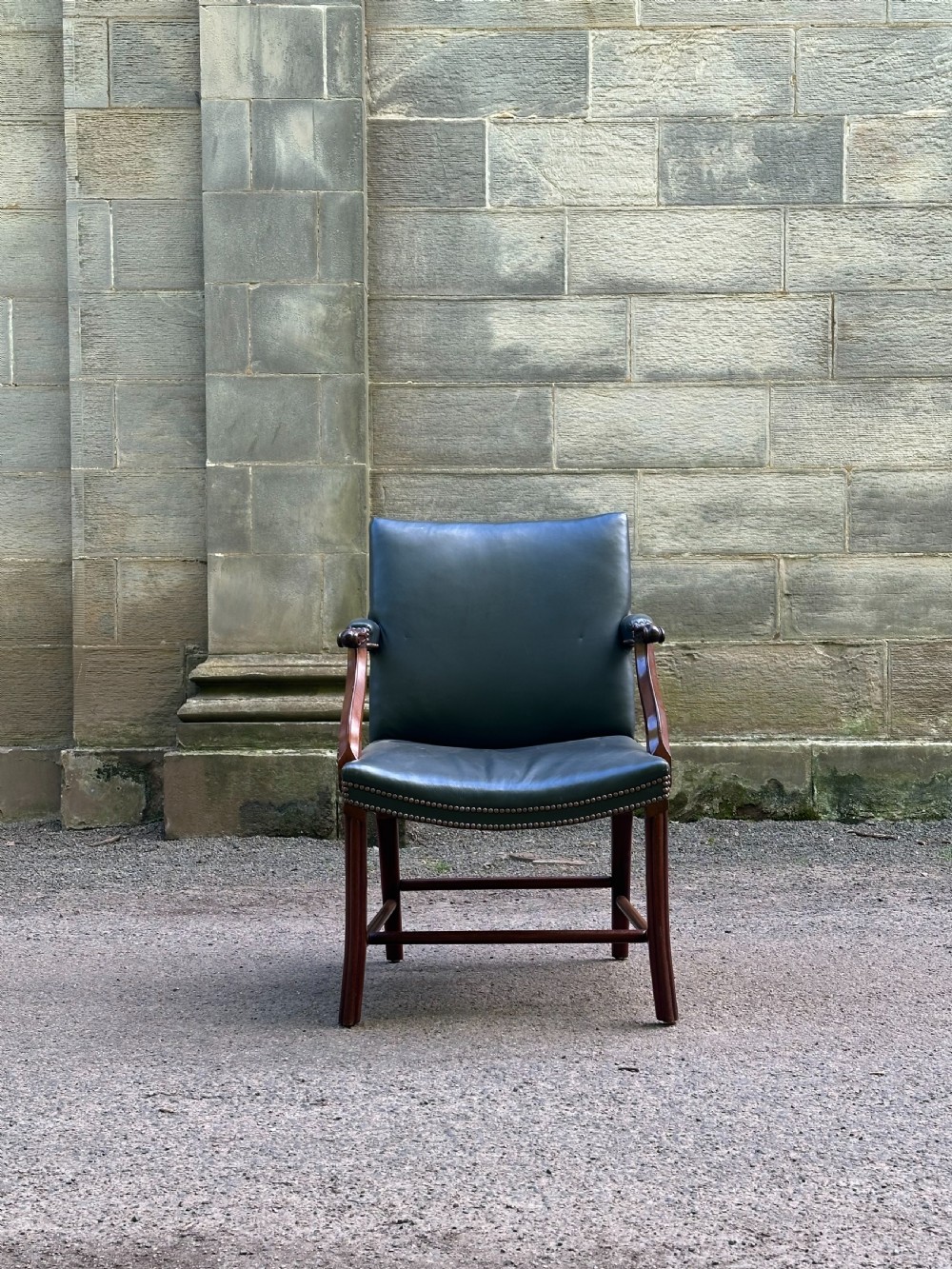 A Scottish mahogany Cockpen library chair by Whytock & Reid of Edinburgh View IV