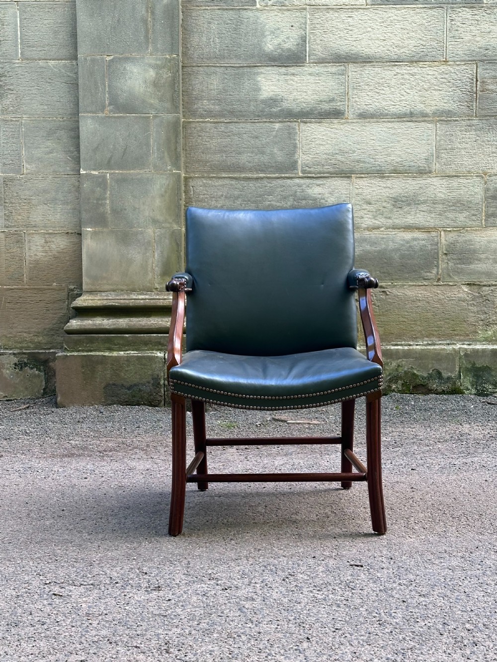A Scottish mahogany Cockpen library chair by Whytock & Reid of Edinburgh View V