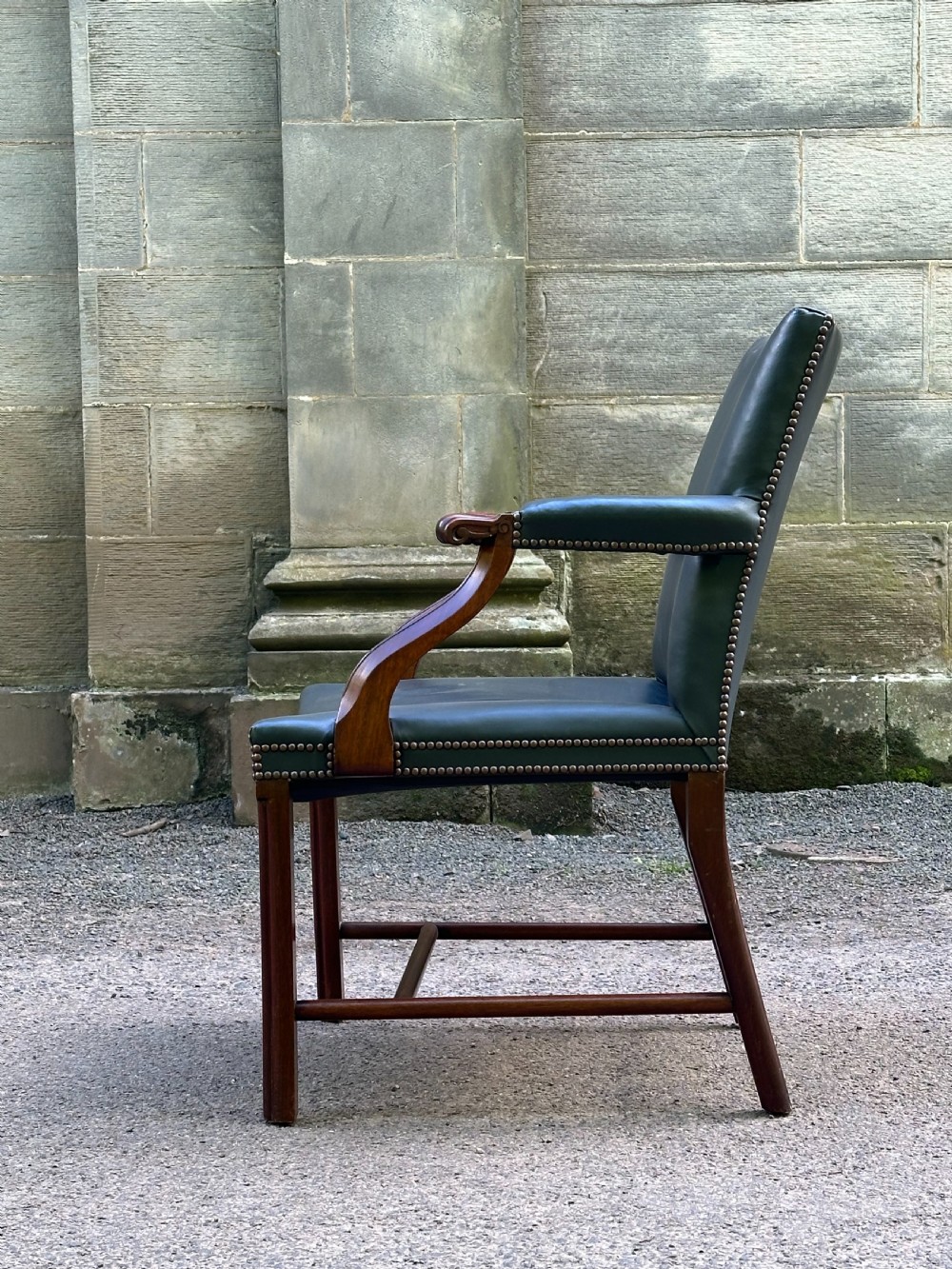 A Scottish mahogany Cockpen library chair by Whytock & Reid of Edinburgh