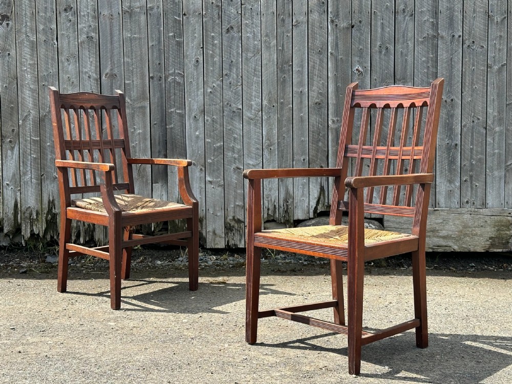 A set of eight Arts and Crafts walnut dining chairs in the manner of Philip Webb, 1860's View VI