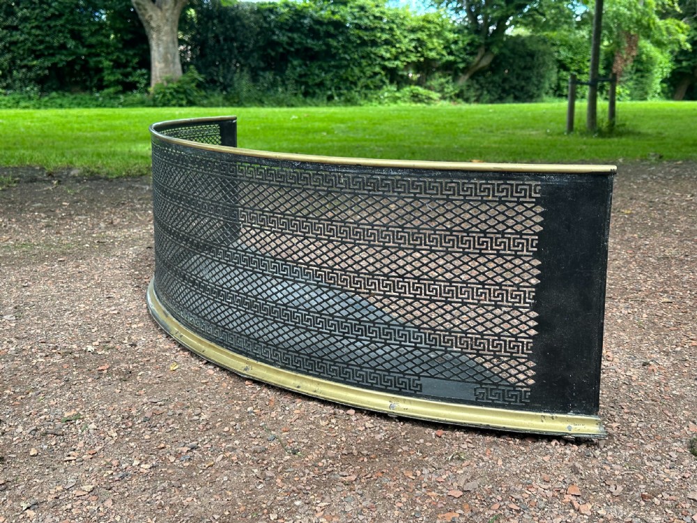 A Scottish George III lacquered steel and brass fender, possibly by David Robertson of Edinburgh