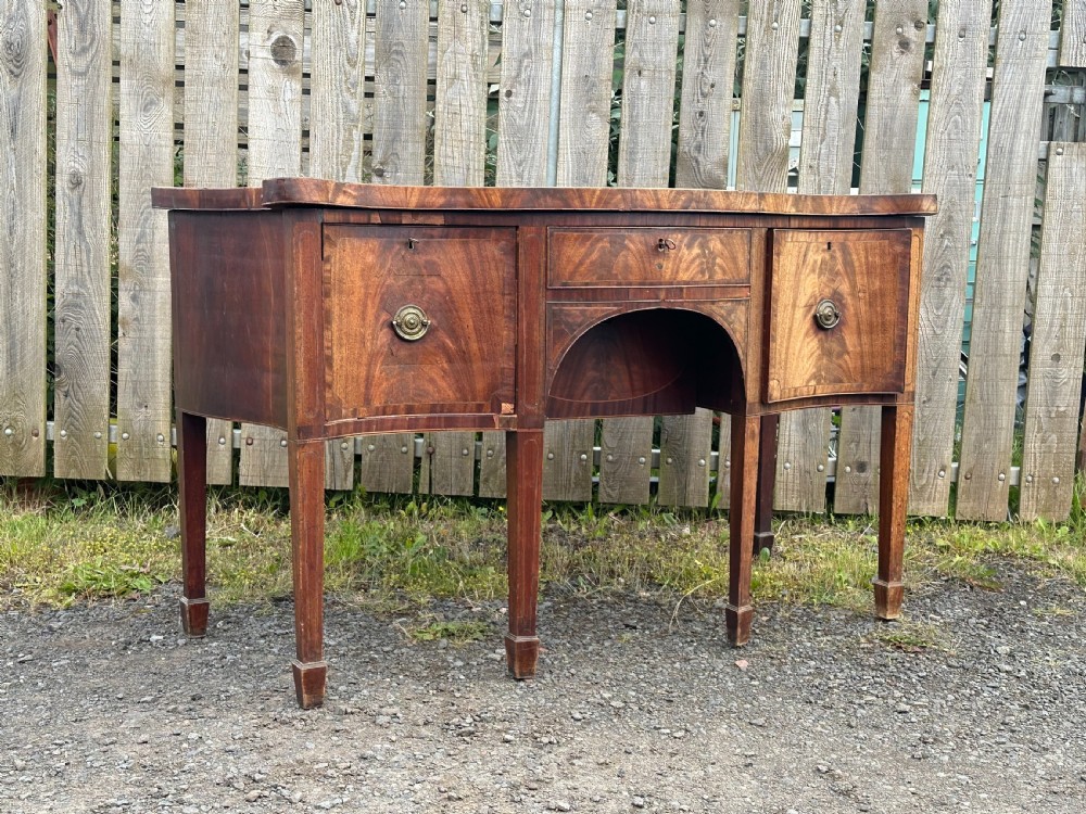  A fine George III mahogany and cross-banded sideboard, English c.1770