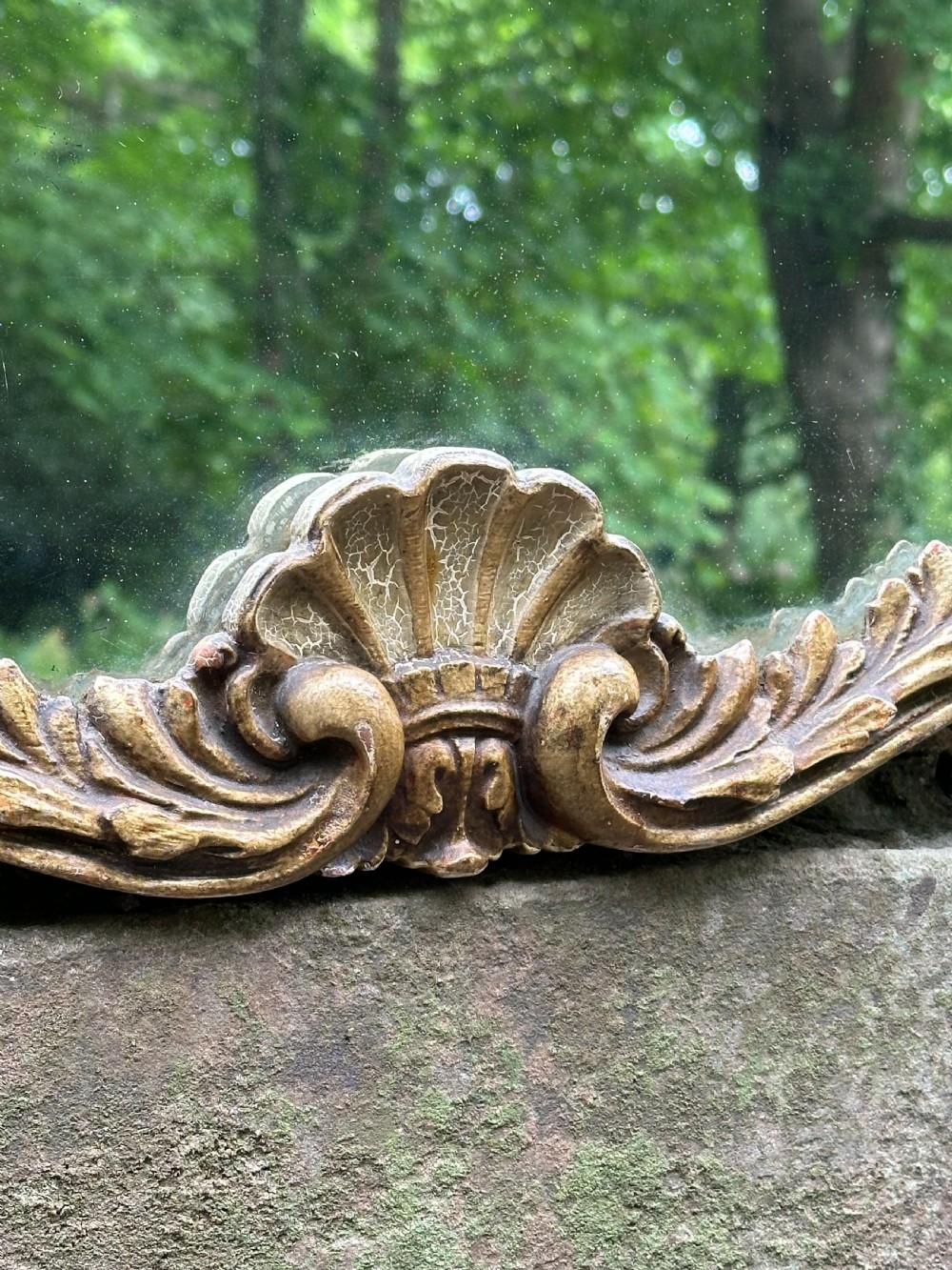 A chic 1920's cartouche-shaped wall mirror, probably by Whytock and Reid  View III