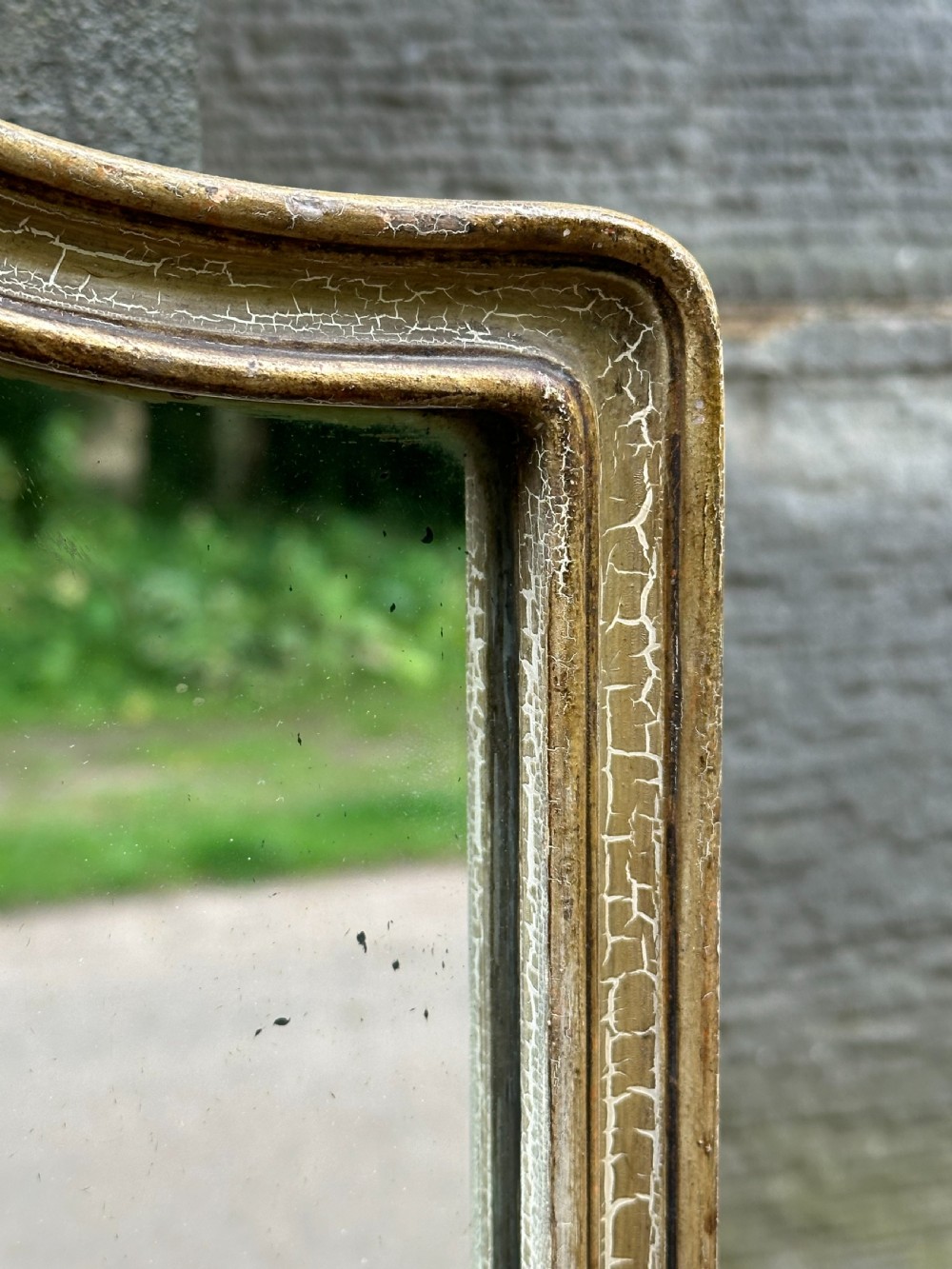 A chic 1920's cartouche-shaped wall mirror, probably by Whytock and Reid  View IV