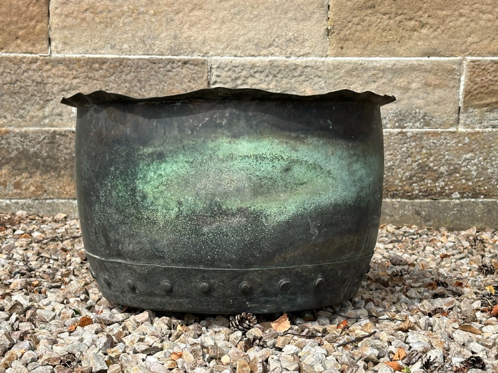 A 19th century rivetted copper planter