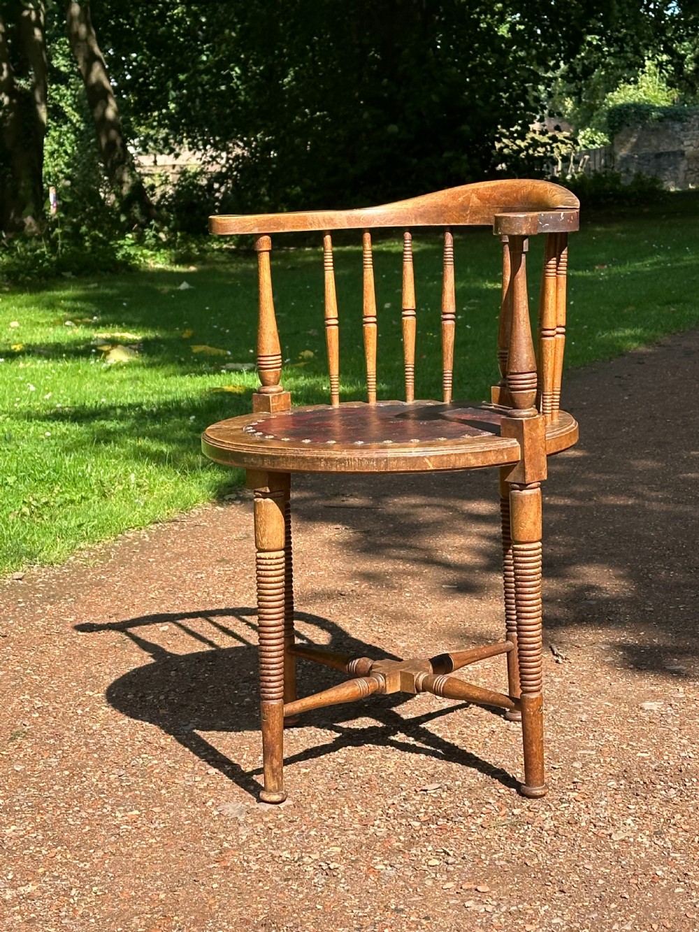 An Art Furniture walnut and leather upholstered chair, attributed to Liberty's / William Birch c.1900 View VII