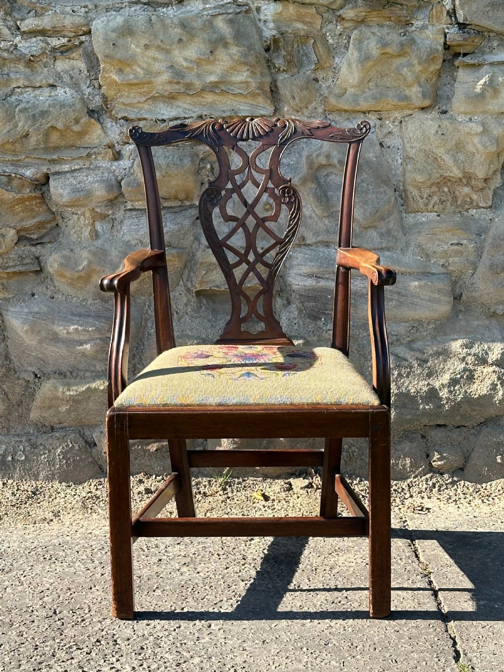 A fine George III 'Chinese Chippendale' carved mahogany side chair