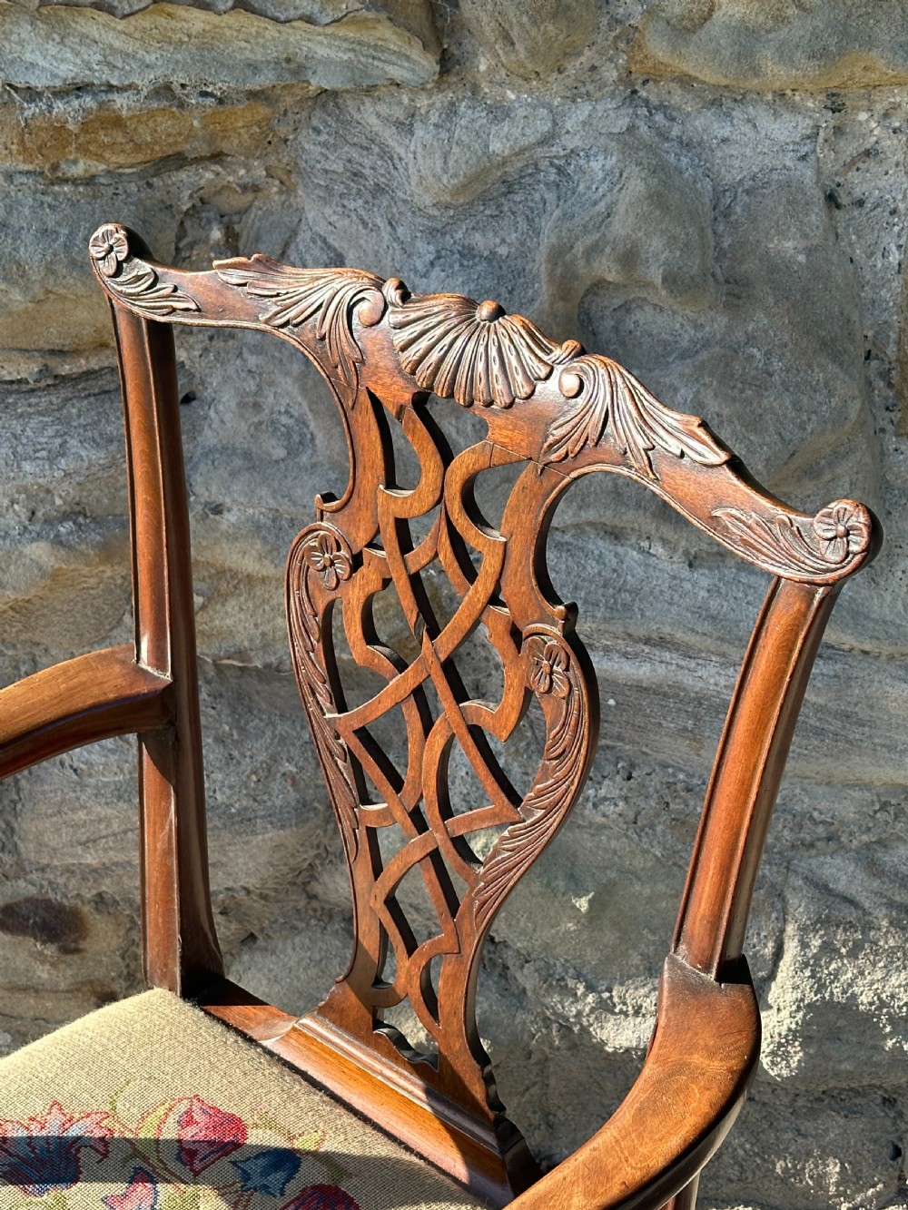 A fine George III 'Chinese Chippendale' carved mahogany side chair View II