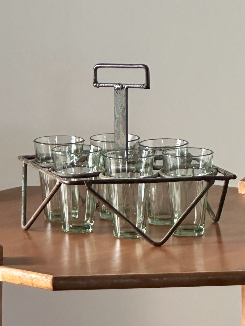 A painted metal glass carrier and six glasses, 1930's