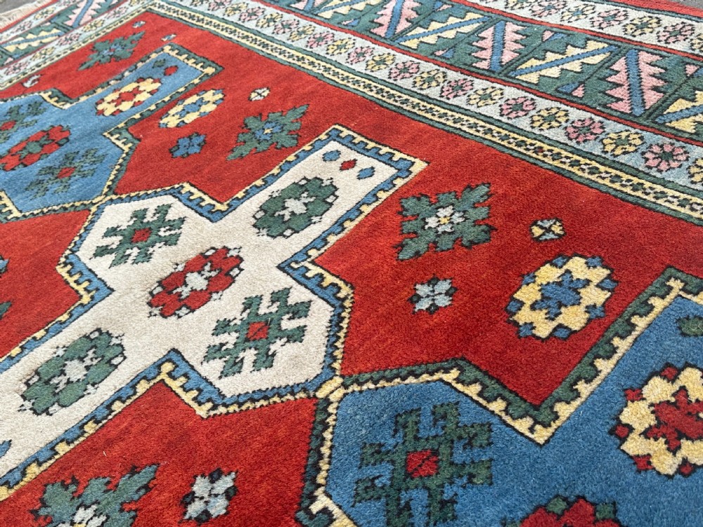 A hand-knotted Kazak rug View III
