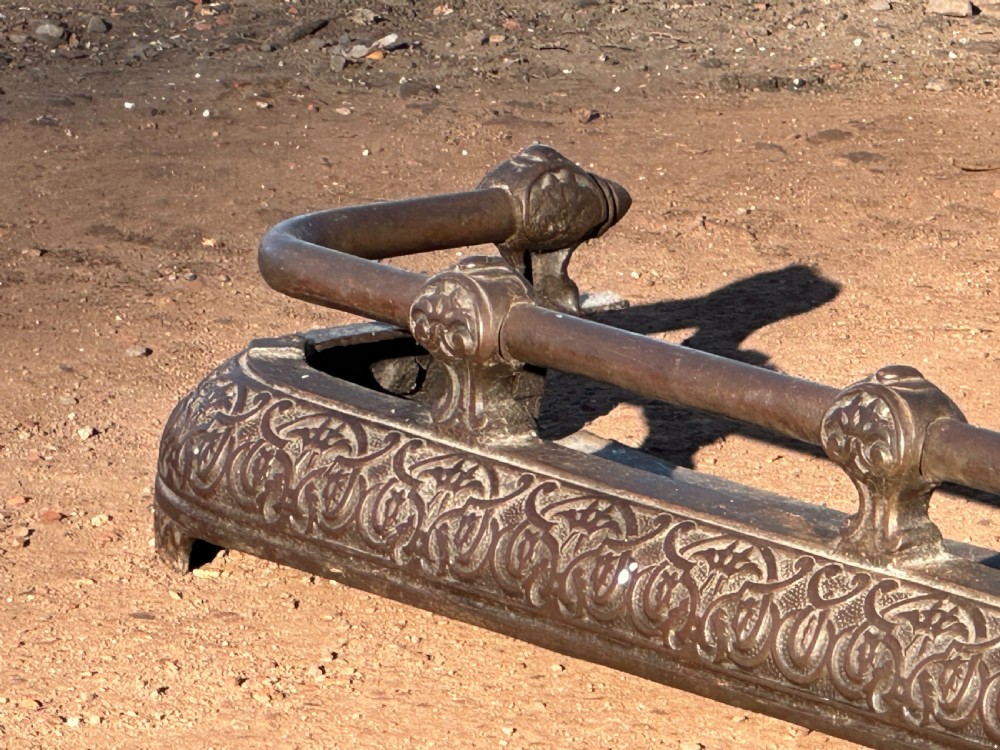 A Victorian cast iron fender, with Arabesque designs in the manner of Owen Jones, c.1860 View II