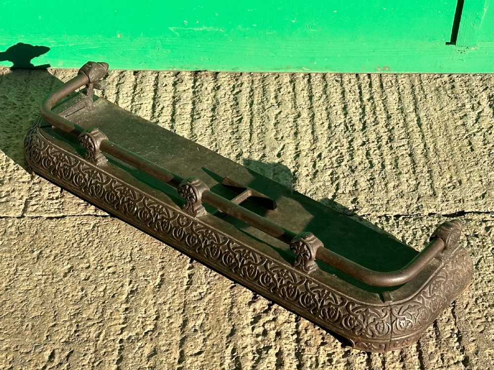 A Victorian cast iron fender, with Arabesque designs in the manner of Owen Jones, c.1860 View VI