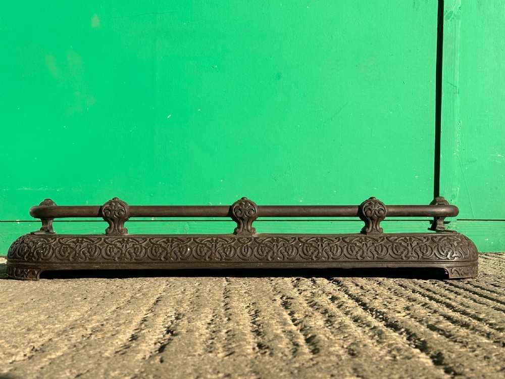 A Victorian cast iron fender, with Arabesque designs in the manner of Owen Jones, c.1860 View VII