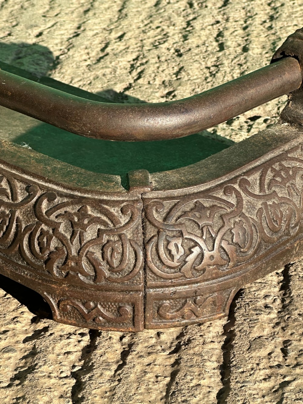 A Victorian cast iron fender, with Arabesque designs in the manner of Owen Jones, c.1860 View VIII