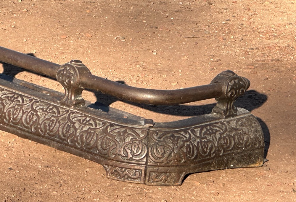 A Victorian cast iron fender, with Arabesque designs in the manner of Owen Jones, c.1860 View IX
