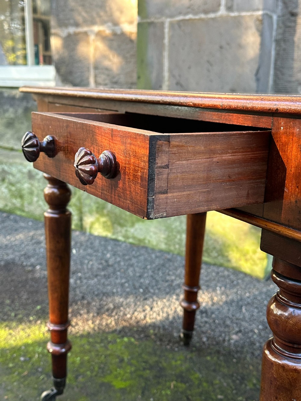 A George IV mahogany library or writing table attributed to Taprel. Stephen & Holland c.1830 View IV