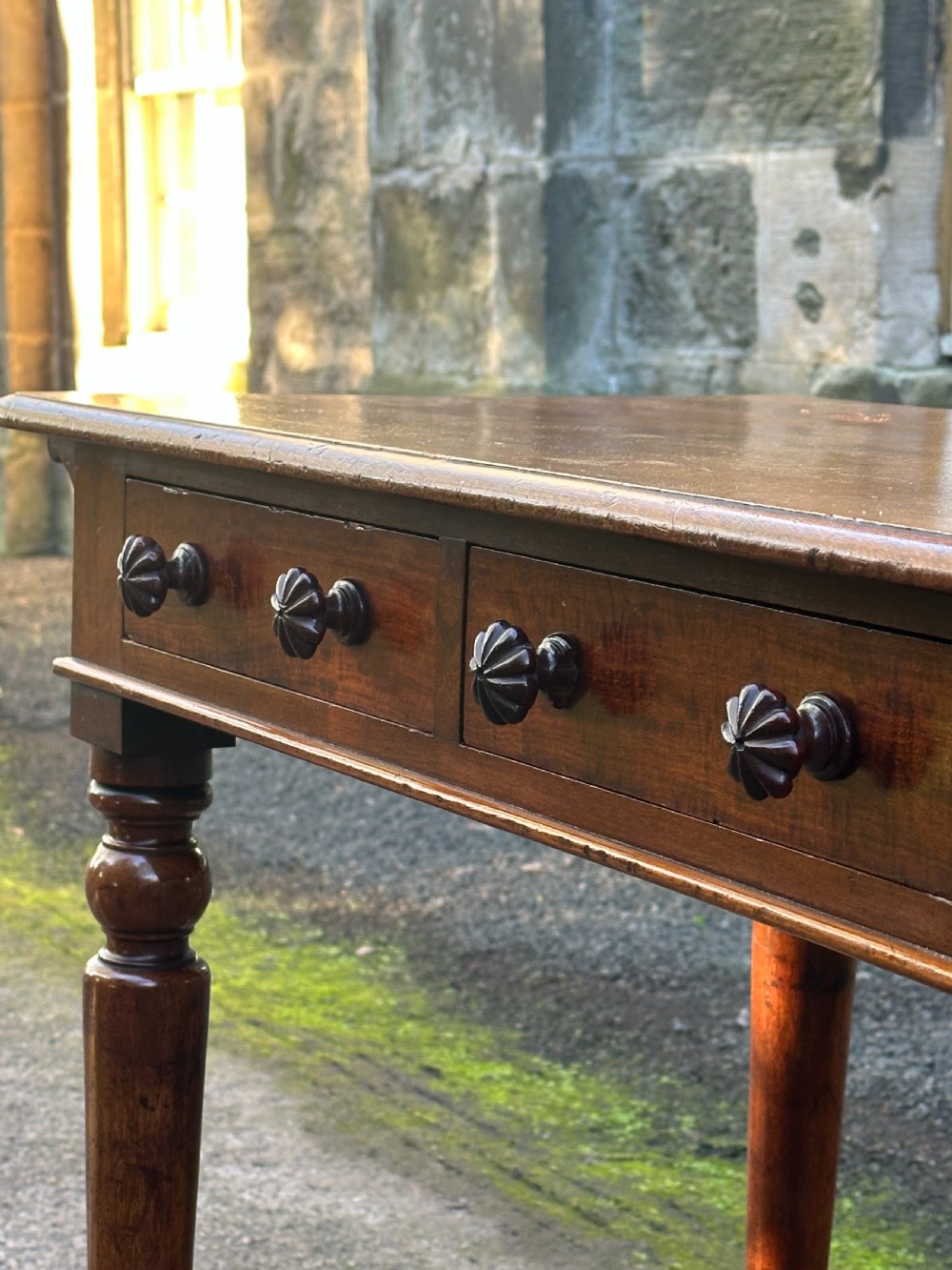 A George IV mahogany library or writing table attributed to Taprel. Stephen & Holland c.1830 View V